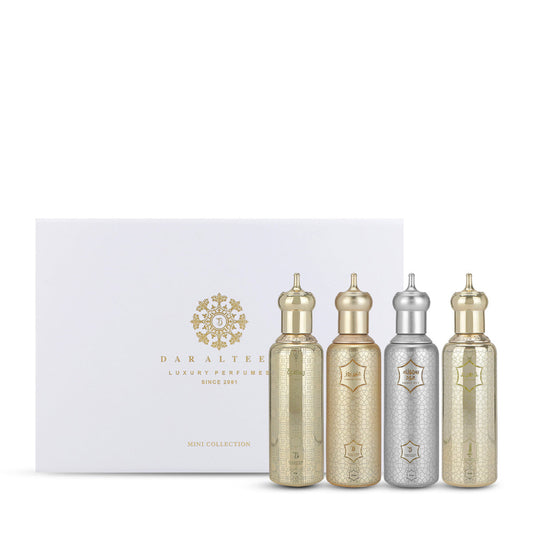 Set of four Arabisque Mini Collection white perfume bottles, unisex fragrances by Dar Al Teeb, 30ml each.