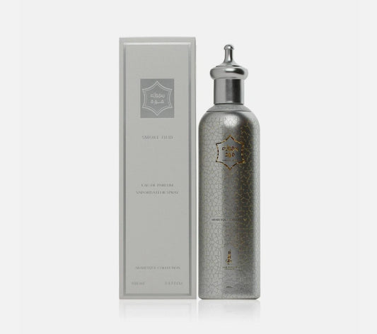 Unisex Smoke Oud Arabesque perfume bottle from Dar Al Teeb, 75ml, with intricate Arabic-inspired design and elegant fragrance packaging.