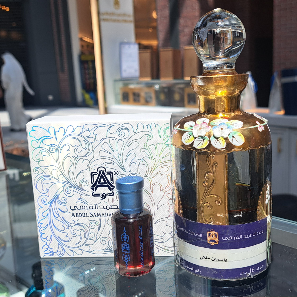 Unisex Royal Jasmine Oil by Abdul Samad Al Qurashi, luxurious body oil with floral jasmine scent in a clear glass bottle.